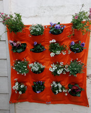 Load image into Gallery viewer, Bloombagz vertical garden, herb planter or wall hanging storage solution made out of recycled bottles